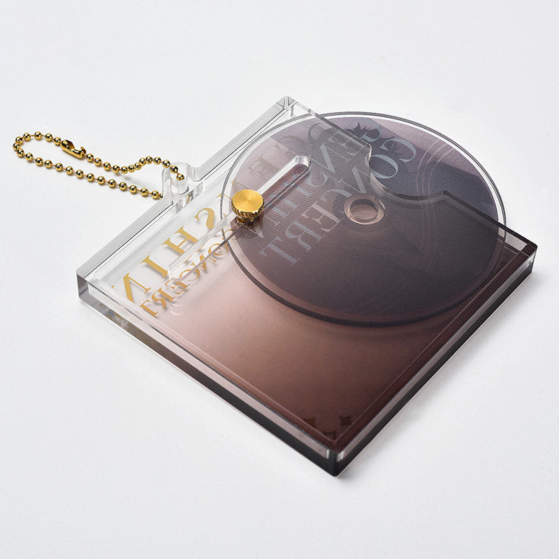 Genshin Impact metal badge close up embossed detail texture finish
