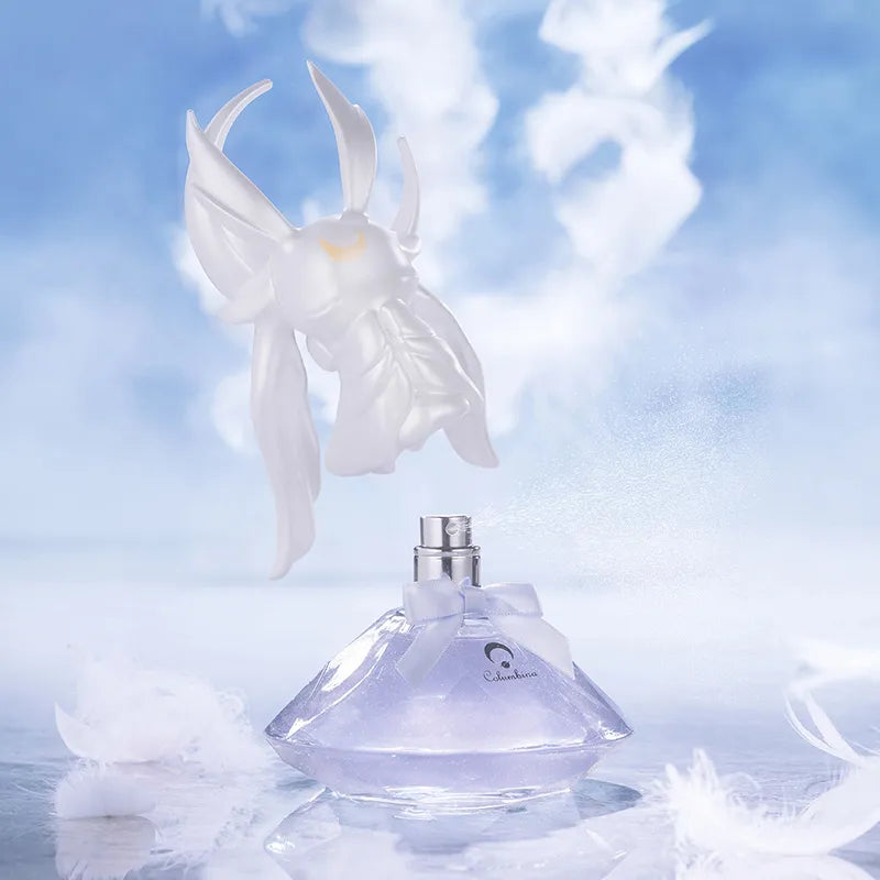 Columbina lavender perfume bottle with pearlescent sculpted cap