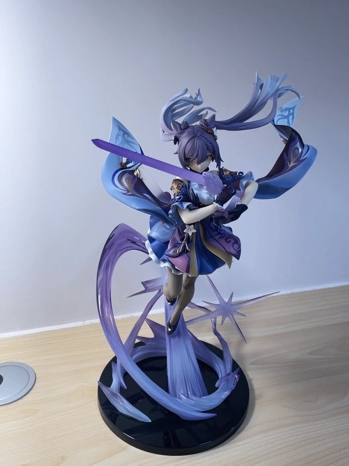 Customer snapshot of Keqing Genshin Impact figure displayed on desk