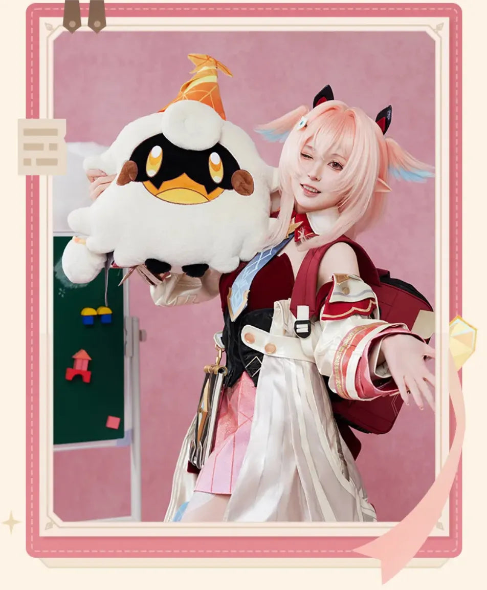 Close-up of Lumi plush pillow embroidery and character details