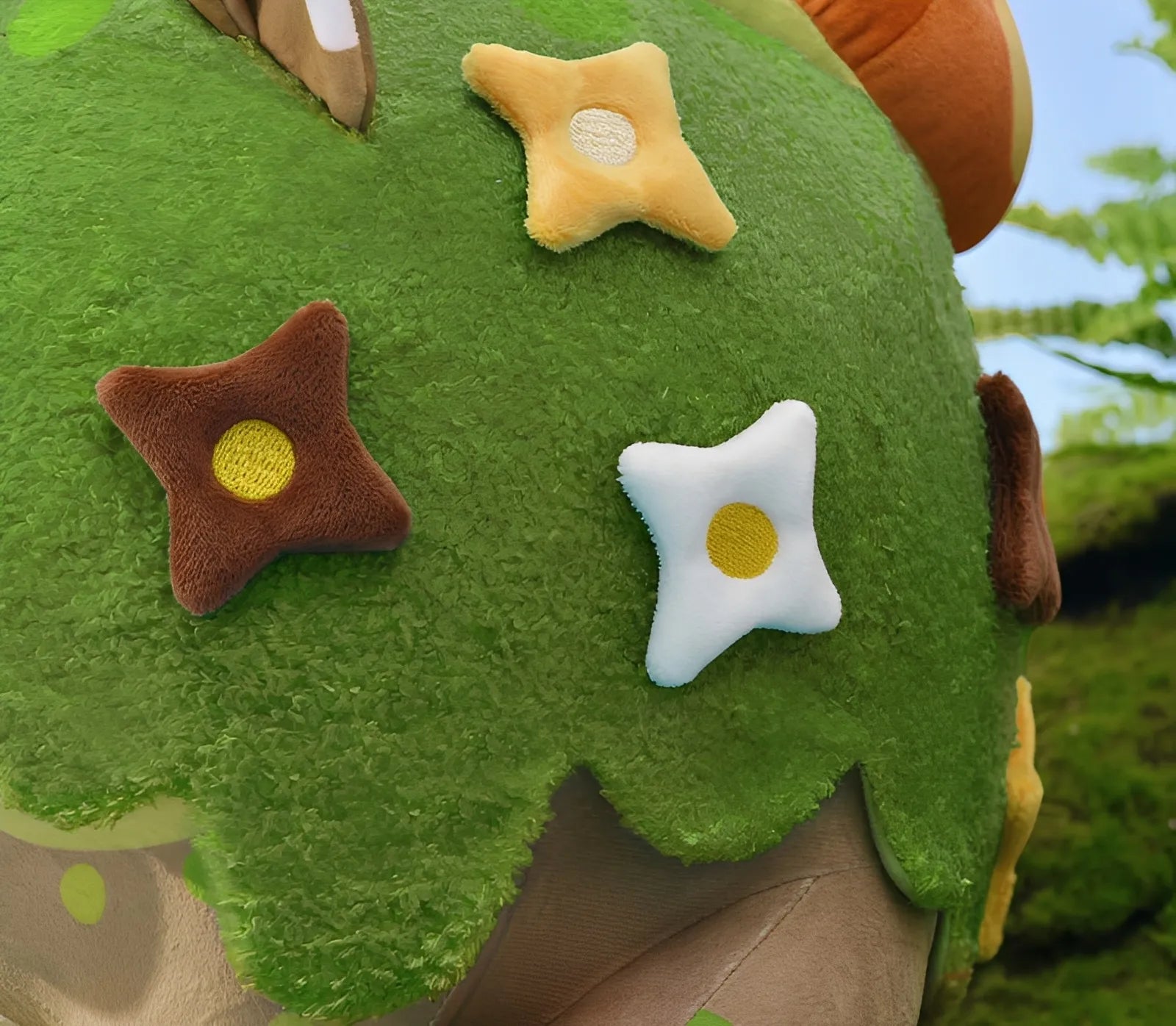 Genshin Impact Shroomboar plush held in hands for size reference