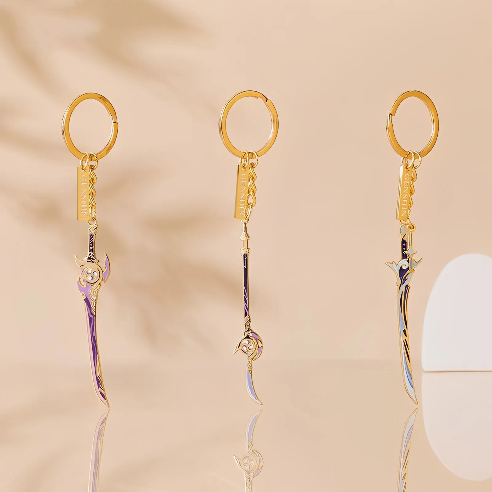 Genshin Impact Divine Casting weapon metal charm collection featuring iconic weapons