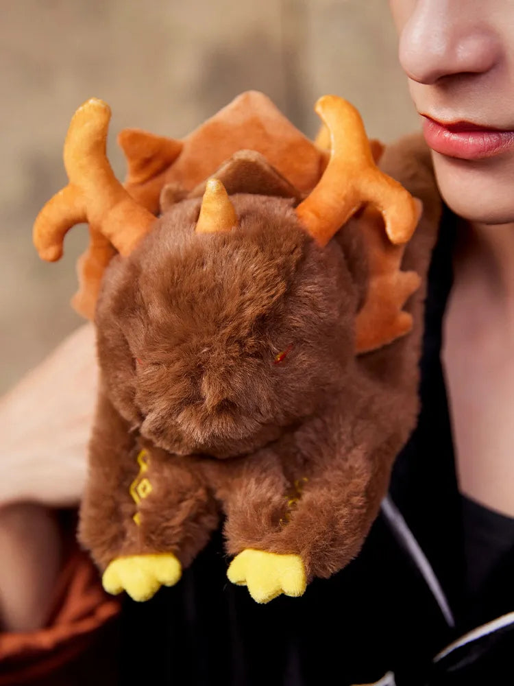 Close-up detail of Genshin Impact Zhongli themed plush toy scarf and soft fabric finish