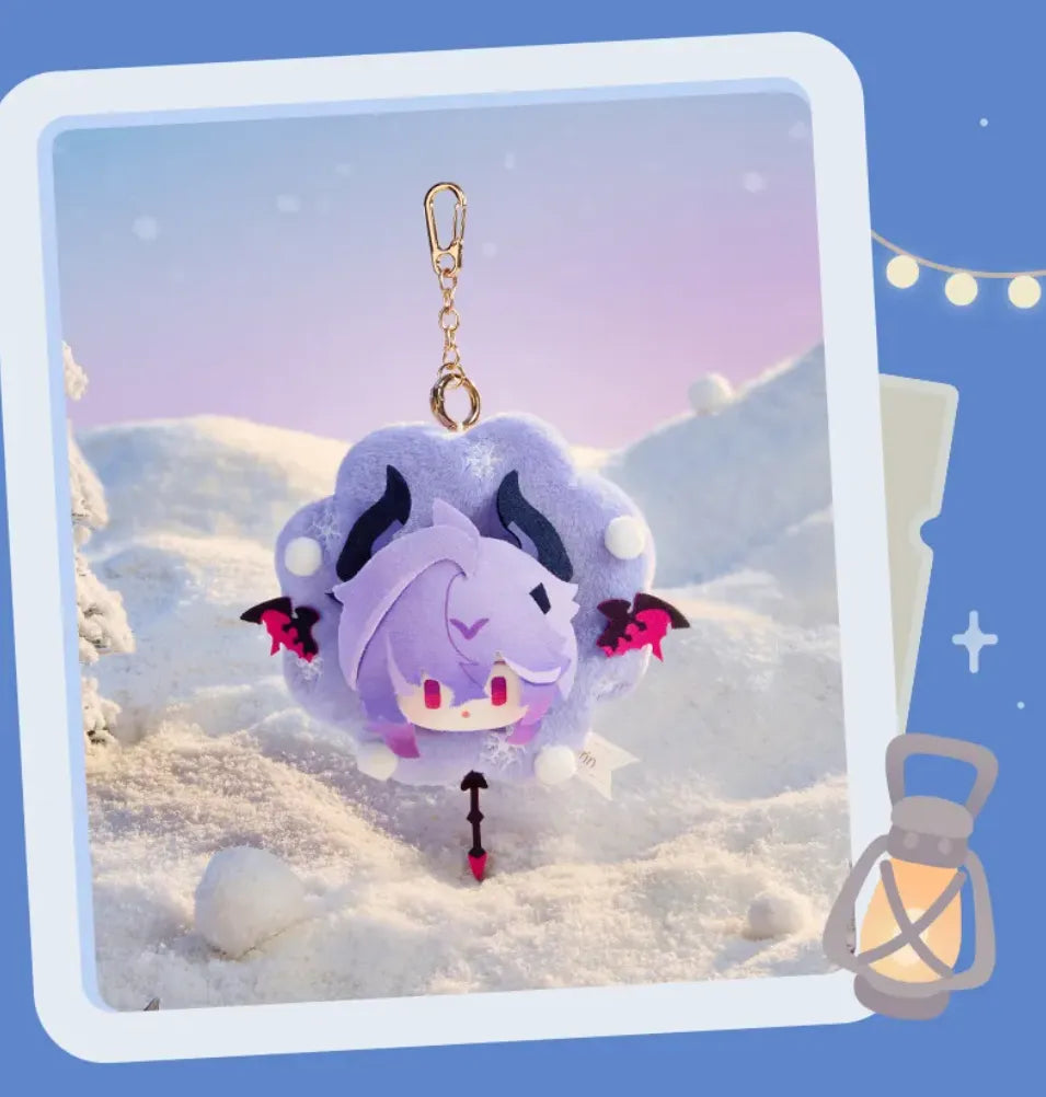 Four character plush charms displayed in a winter setting