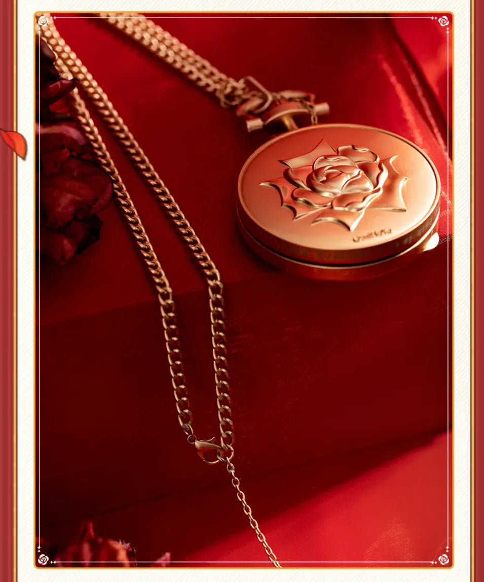 Pocket watch-style metal charm displayed with decorative collectible presentation