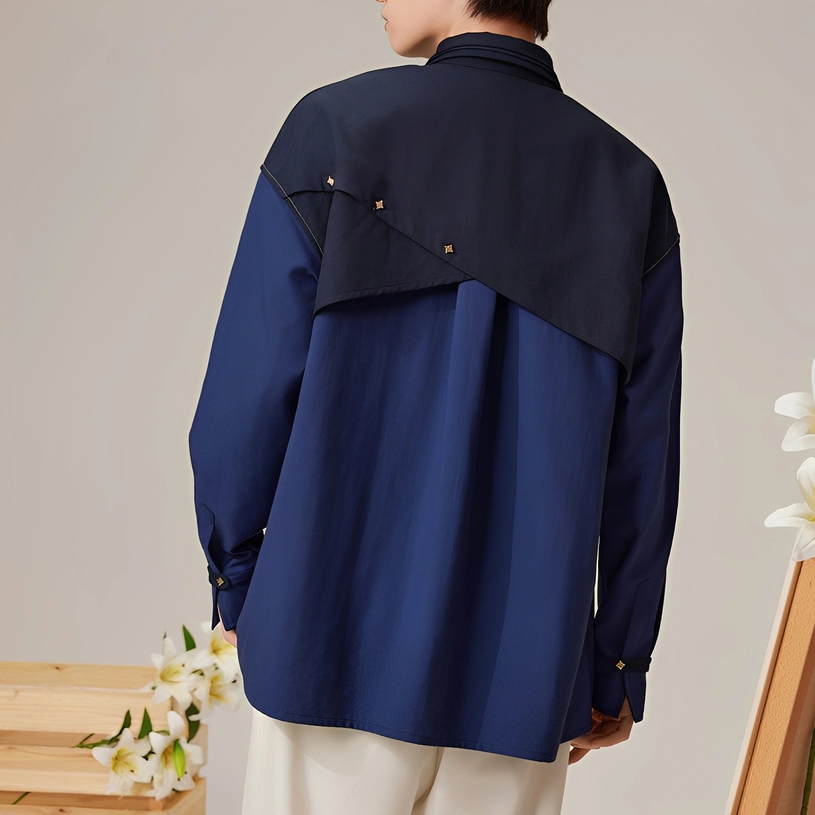 Official Genshin Impact Albedo navy casual shirt back view showing layered shoulder design
