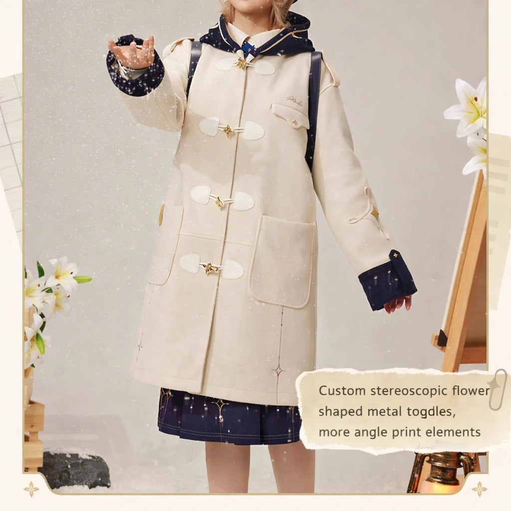 Albedo wool coat design details including metal charms and embroidered accents