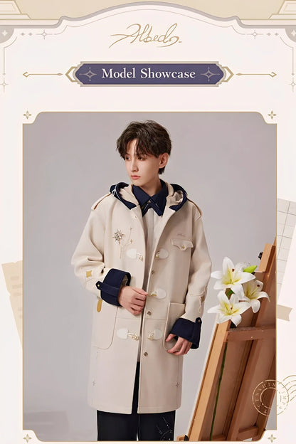 Styling detail of Genshin Impact Albedo Theme Impression brooch worn on outerwear highlighting chain drape and fantasy accessory look