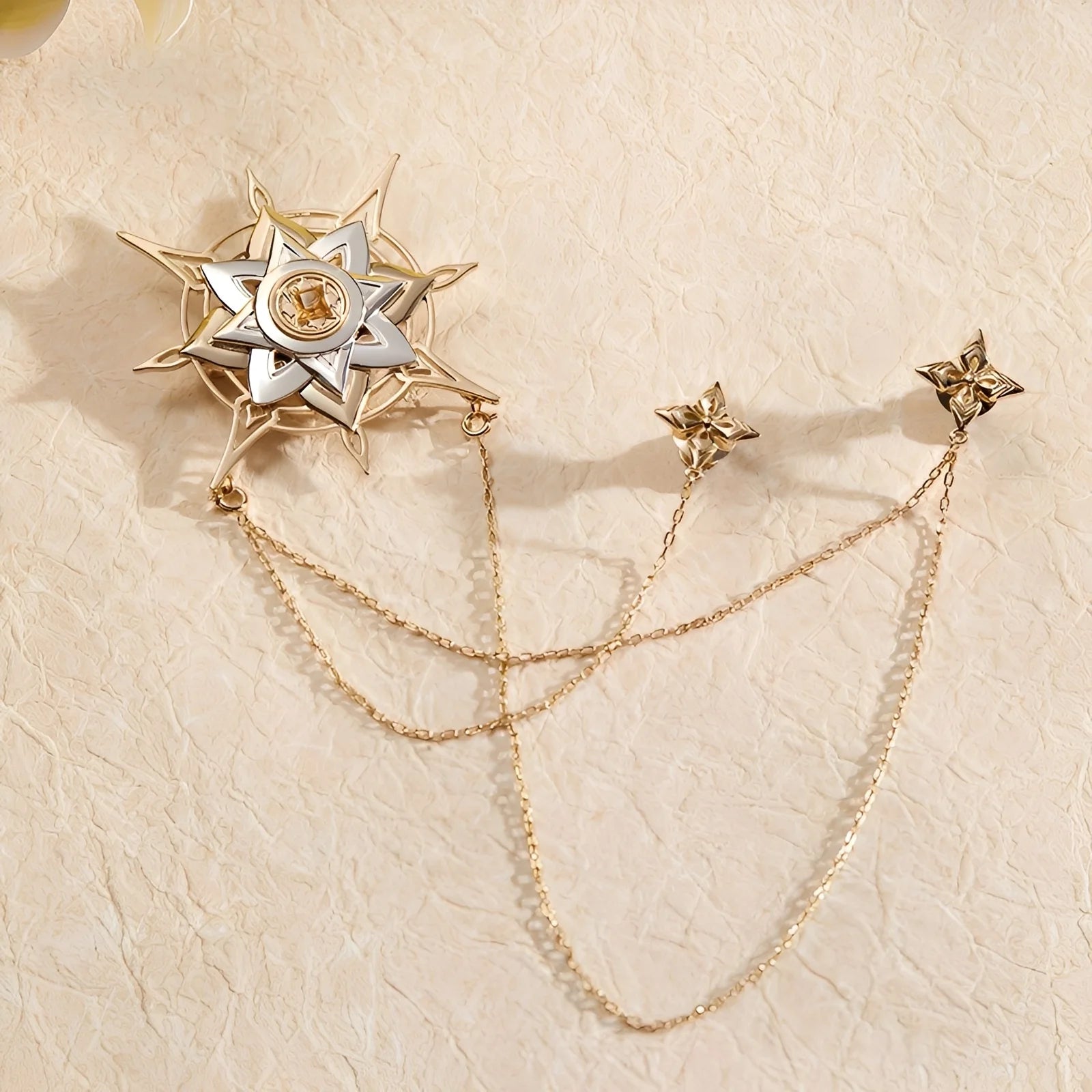 Genshin Impact Albedo Theme Impression brooch featuring layered brass design with celestial star motif and flowing gold chains, full product view