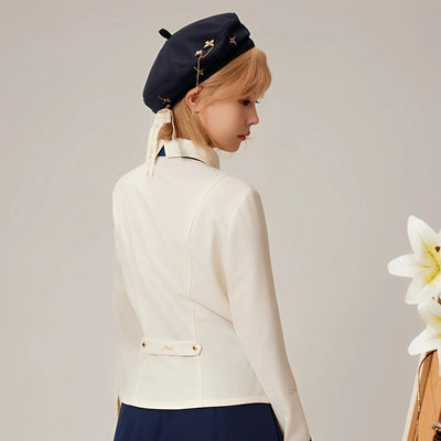 Back view of the Albedo waist-fitted shirt showing tailored silhouette and fitted waist design