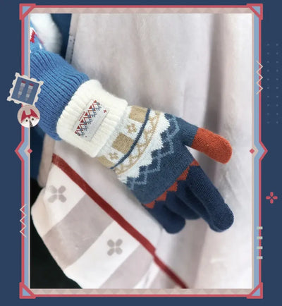 Alyosha cape character-themed geometric pattern in red blue and cream