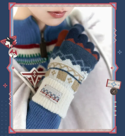 Close-up of Alyosha knitted glove cuff and character-themed woven label