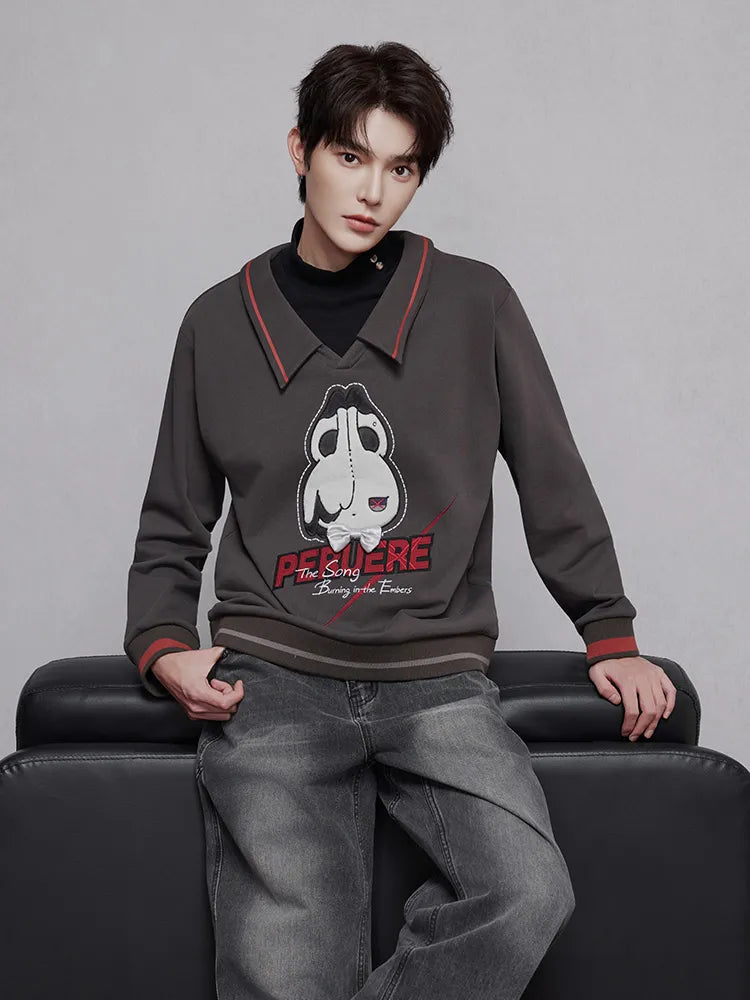 Arlecchino themed charcoal sweatshirt with striped cuffs and hem