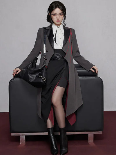 Arlecchino themed long coat asymmetrical lapel and decorative brooch details