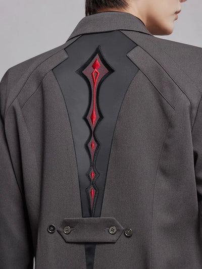 Arlecchino themed charcoal coat with embroidered back panel details