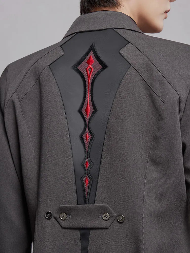 Arlecchino themed charcoal coat with embroidered back panel details