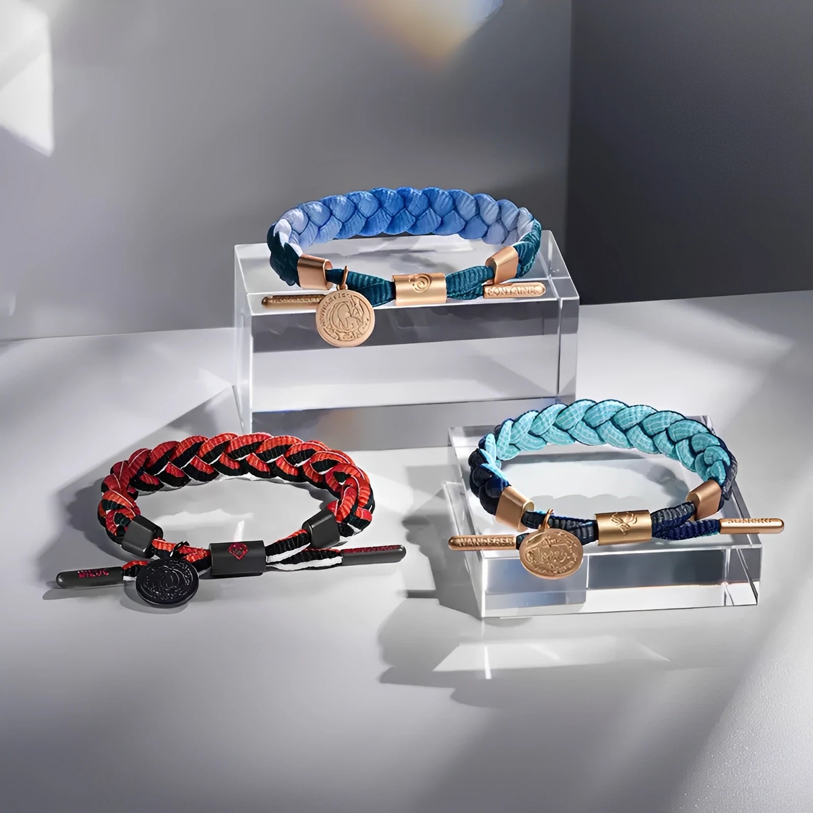 Styled display of Genshin Impact character-inspired braided bracelets with woven cord and metal accents