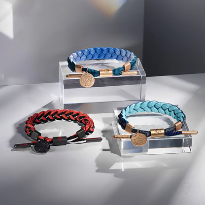 Styled display of Genshin Impact character-inspired braided bracelets with woven cord and metal accents