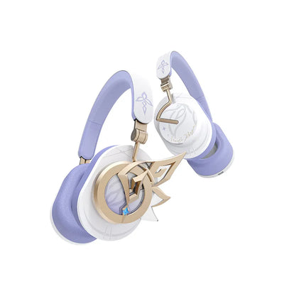Nicole Clamor Within Series over-ear headphones in white, lavender, and gold