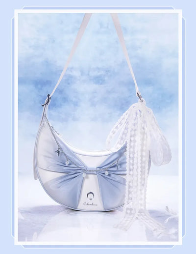 Columbina crossbody bag blue butterfly knot and metal chain details