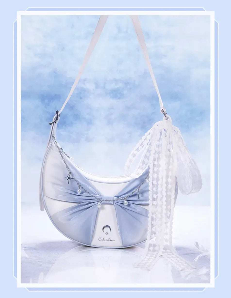 Columbina crossbody bag blue butterfly knot and metal chain details