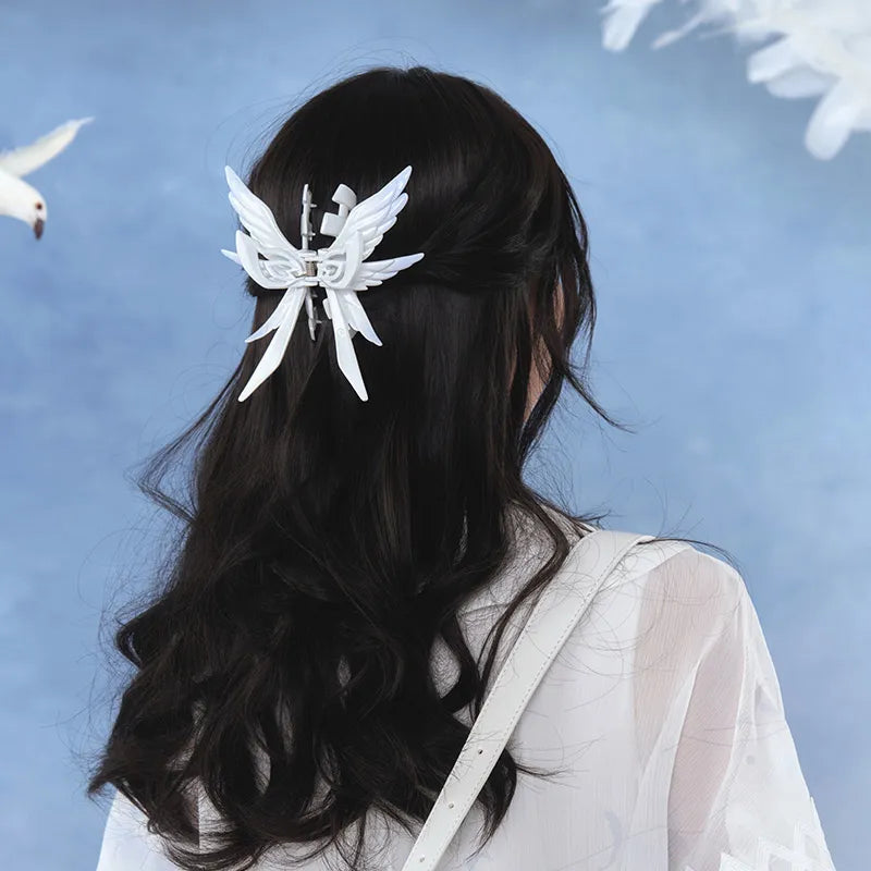 Columbina wing hair claw clip with pearlescent feather details