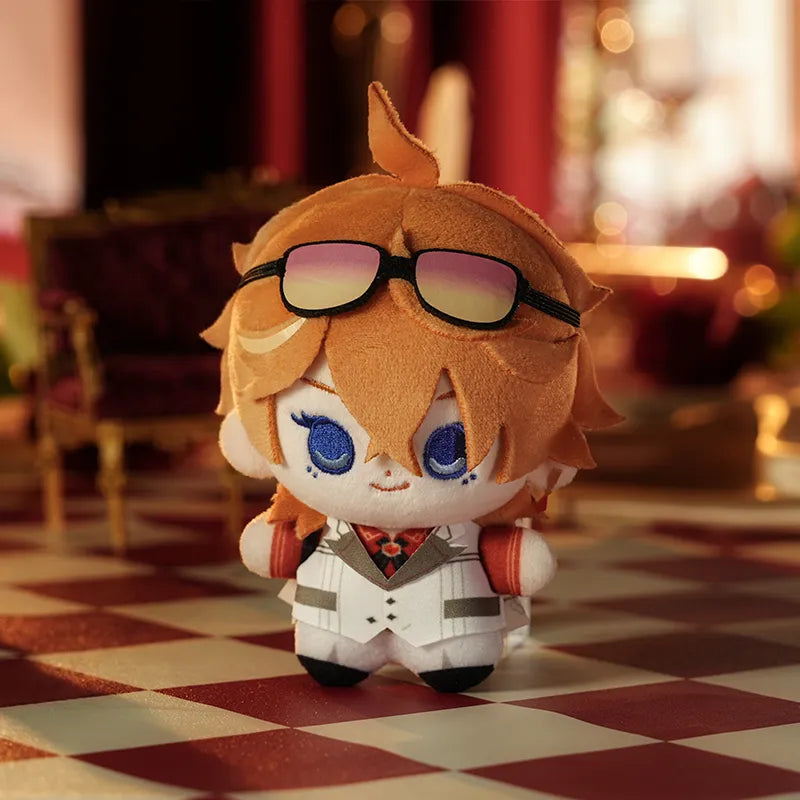 Tartaglia Genshin Impact FES 2026 mini plush displayed inside the suitcase-style gift box