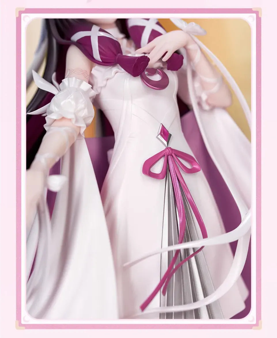 Columbina figure flowing cape and layered costume details