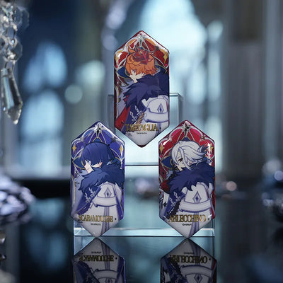Collectible Genshin Impact badges featuring Fatui Harbingers and exclusive artwork