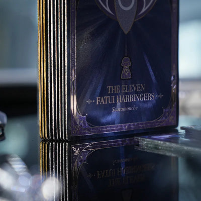 Collectible holographic cards featuring Fatui Harbingers from Genshin Impact