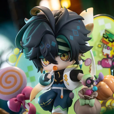 Kinich Chibi Figure with candy-themed decorations and pixel backdrop