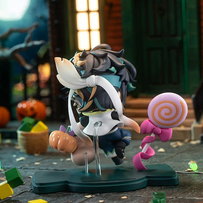 Kinich Chibi Figure displayed with Halloween candy-themed accessories