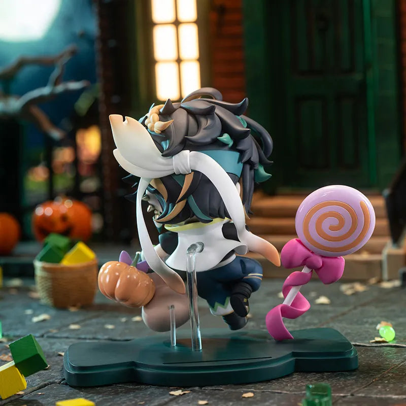 Kinich Chibi Figure displayed with Halloween candy-themed accessories