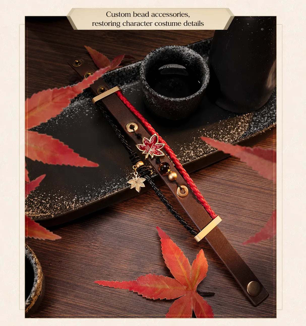 Close-up bracelet photography featuring maple leaf charm and woven red cord
