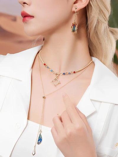 Genshin Kaveh necklace and clip-on earrings featuring layered chain and geometric pendant worn in styling scene