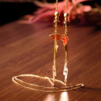 Genshin Impact Kazuha glasses chain detail with maple leaf charm design