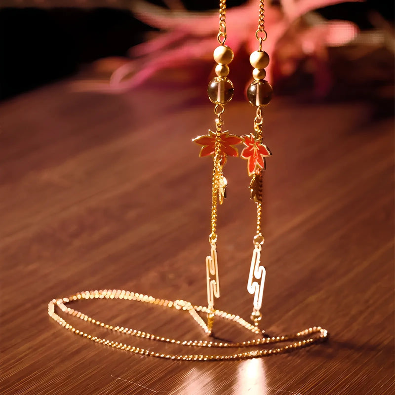 Genshin Impact Kazuha glasses chain detail with maple leaf charm design