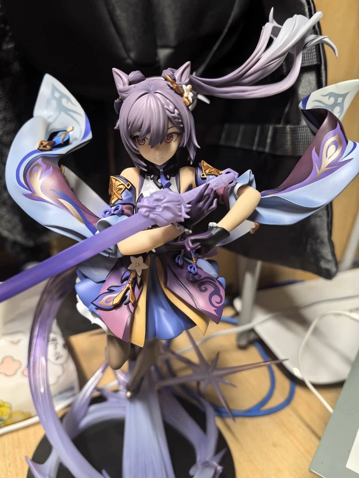 Keqing figure photographed from low angle emphasizing dynamic pose and costume