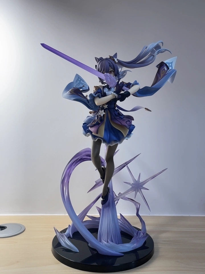 Keqing figure displayed alongside other Genshin Impact figures in customer collection