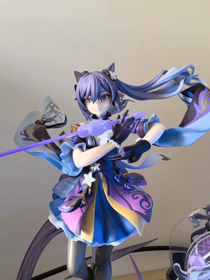 Keqing figure placed among other figures in customer collection photo