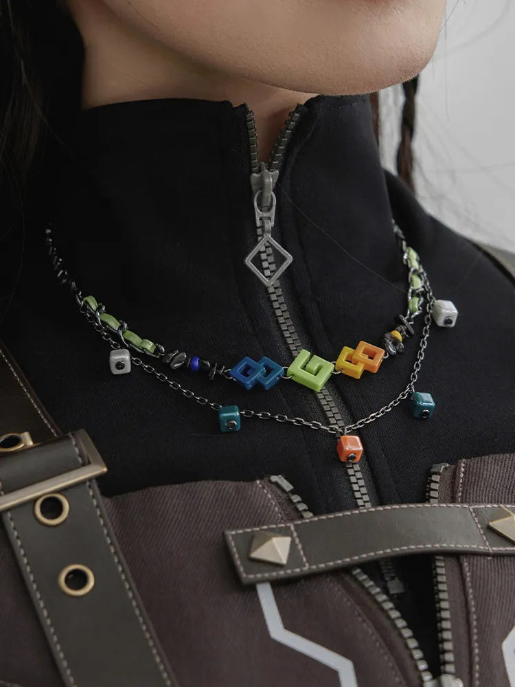 Kinich themed double layer necklace with colorful geometric charms and layered chain details