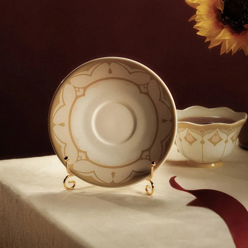 Mirrored Analysis Sandrone tea cup set with gold decorative details