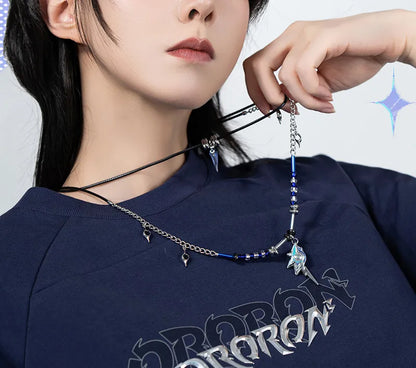 Ororon double layer necklace featuring blue beads and character pendants