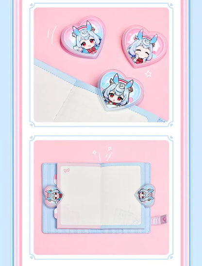 Genshin Impact Sigewinne stationery display featuring notebook acrylic clips and decorative sticker sheets