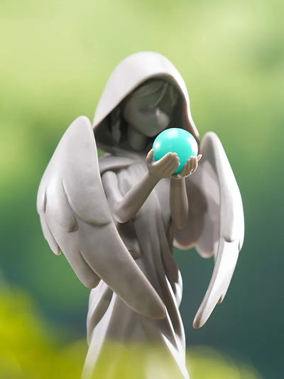Statue of The Seven Anemo figure with glowing turquoise orb