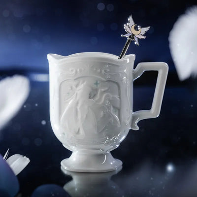Columbina porcelain cup set with moon and wing themed decorative details