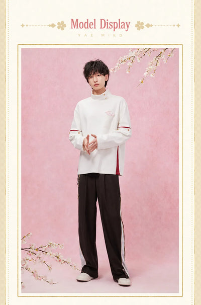 casual pants zipper design with decorative hardware detail