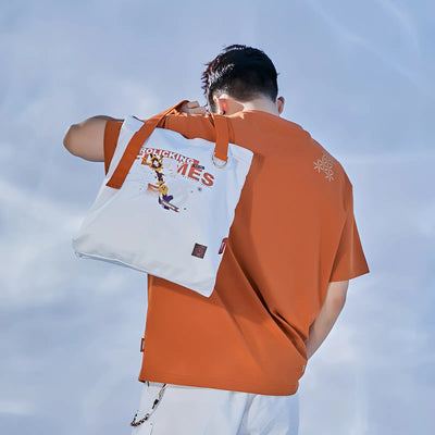 Yoimiya themed canvas tote bag front view with flame design details