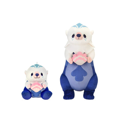 Genshin Impact Yoyo Sea Otter plush keychain displayed on sand with ocean theme background