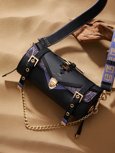 Cyno barrel bag back view worn on model adjustable strap display